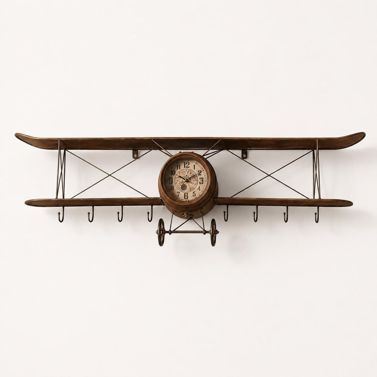 Handcrafted vintage airplane olive wood wall clock with hanging hooks on white background.