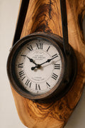 Close up of Roman numerals and natural grain on an olive wood rustic hanging timepiece clock. | Olive Wood Rustic Hanging Timepiece Wall Clock - Olivaryn