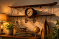 Warm ambient evening glow illuminating a vintage airplane olive wood wall clock on a wall.